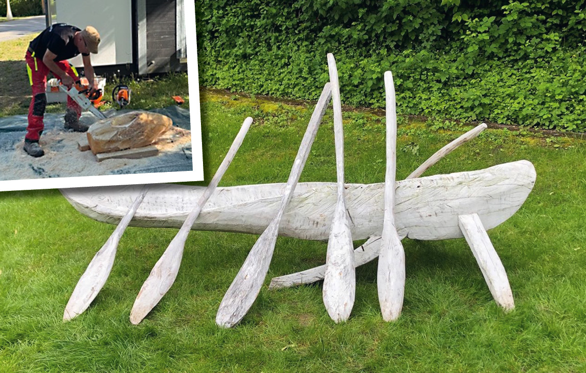 Mit Kettensäge am Holz